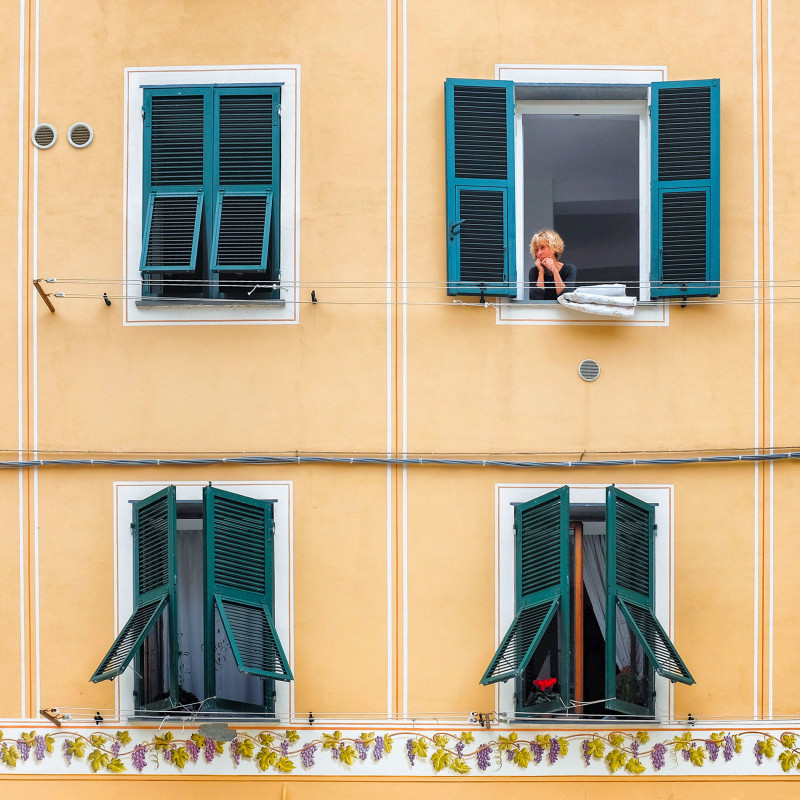 Vernazza woman in window Cinque Terre Italy