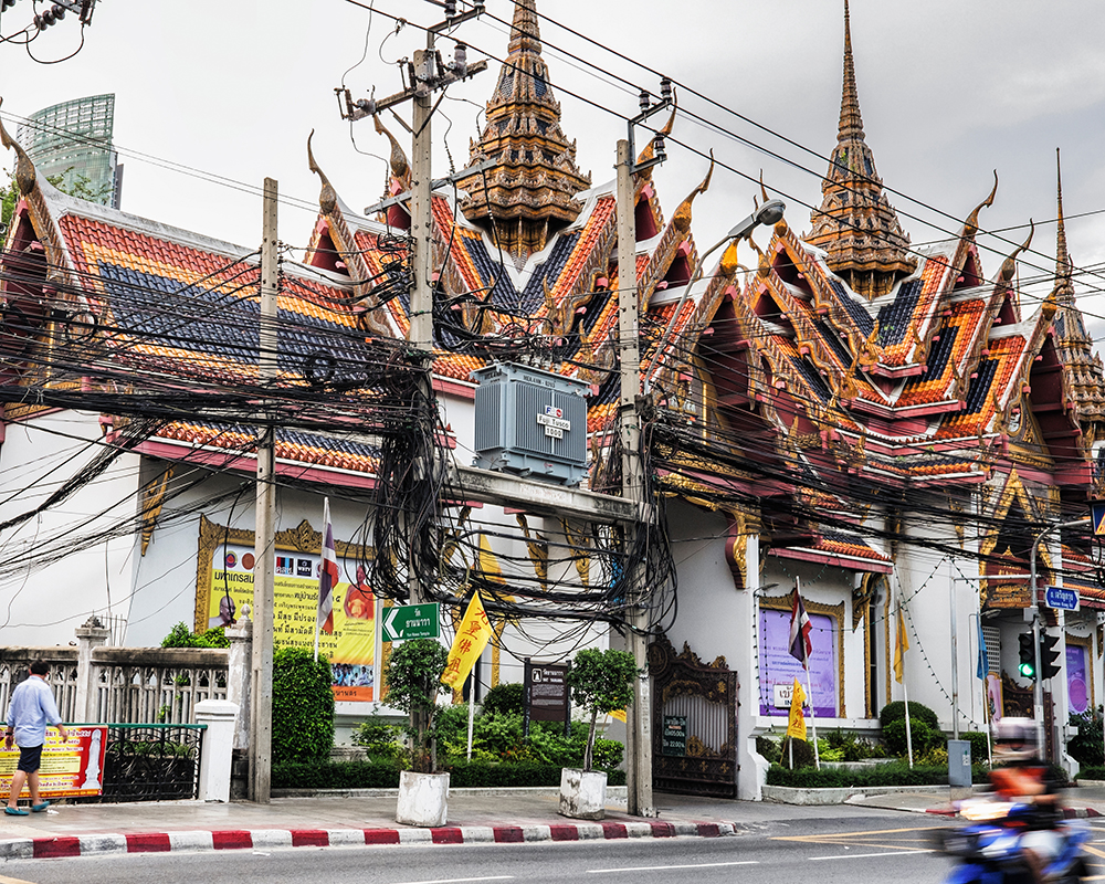 Bangkok temple utility wires Bangkok Thailand