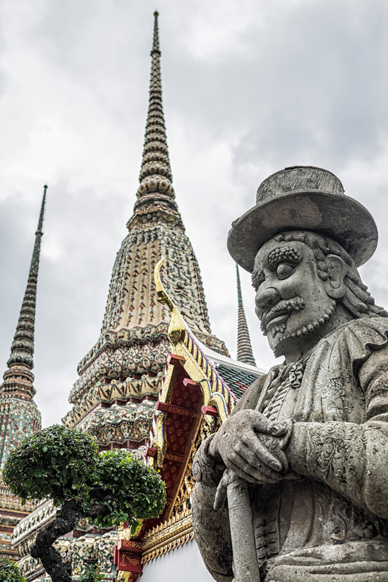 Wat Pho Chinese guard top hat Bangkok Thailand