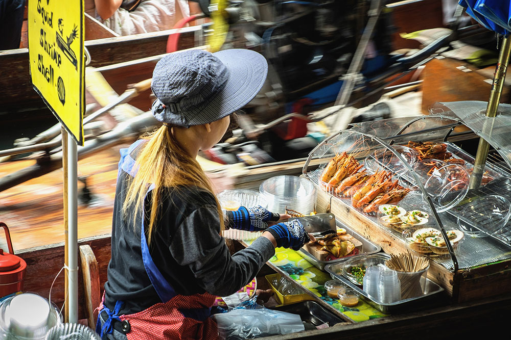 Damnoen Saduak Floating Market squid shrimp vendor Bangkok Thailand