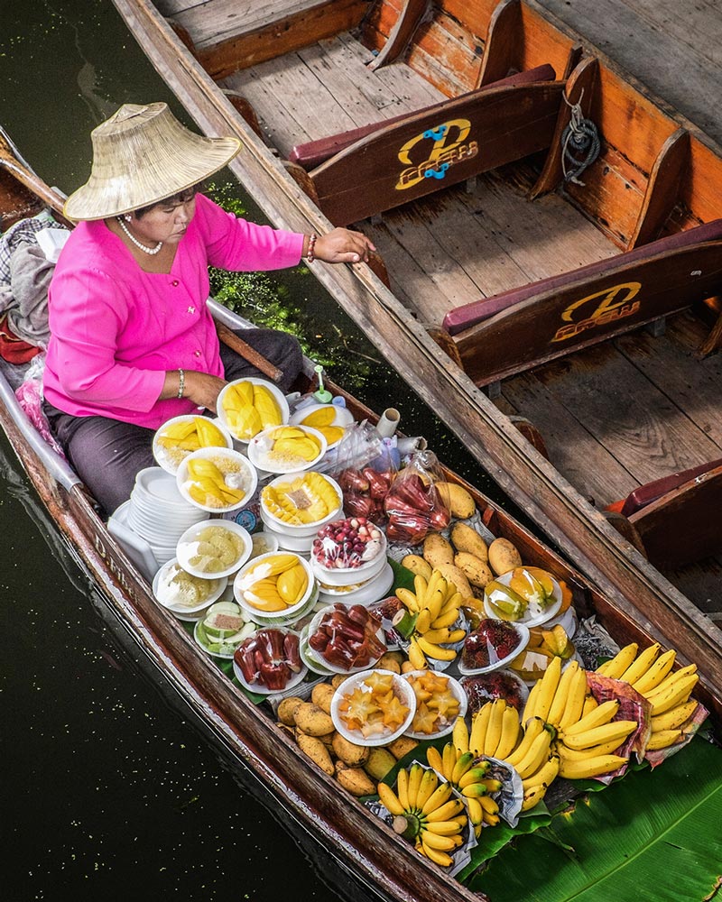 Damnoen Saduak floating market woman pearls Bangkok Thailand